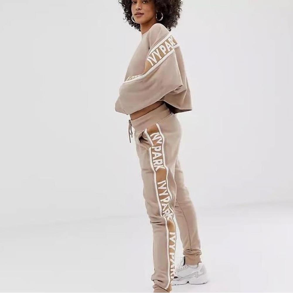 IVY PARK tan logo tape joggers